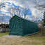 14x42x17 RV/Boat Garage House Style, green, angled view in a backyard